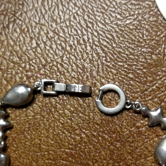 Givenchy silvertone and rhinestone tennis bracelet - Picture 4 of 7